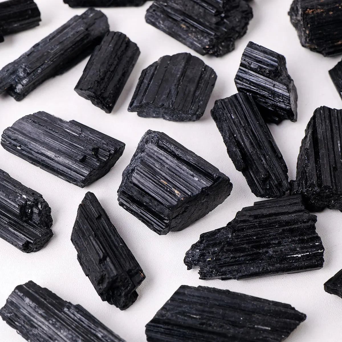 Black Tourmaline Stones – Raw Mineral Specimens (100g Bag)